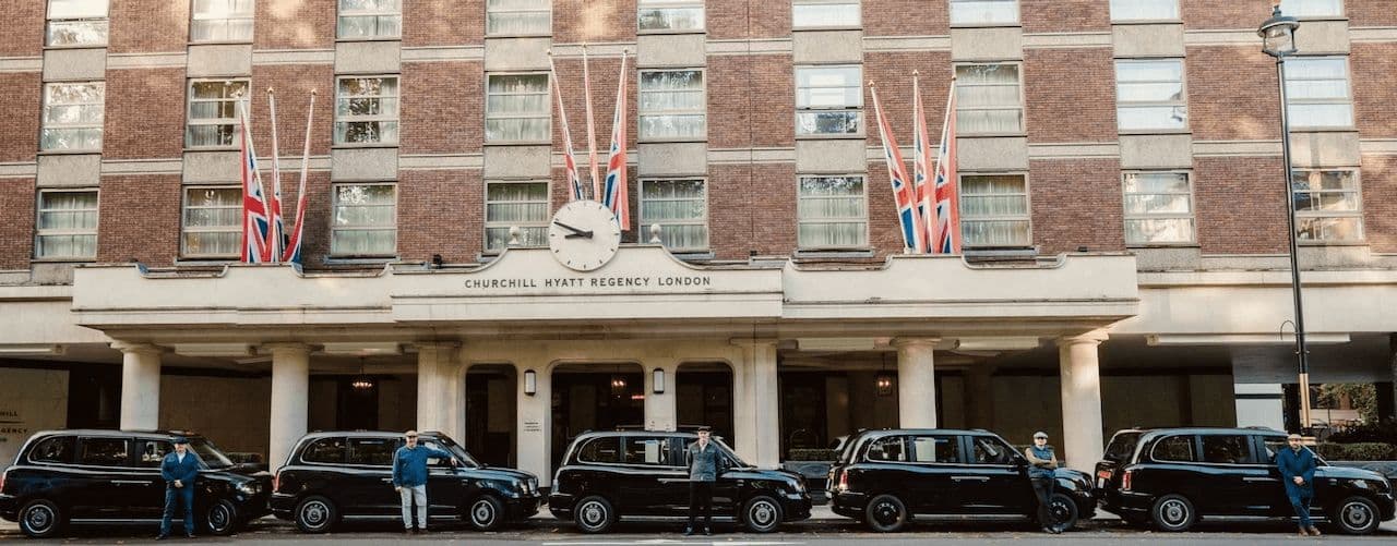 Taxi lineup at Hyatt Regency Churchill, front entrance, London Highlights corporate tour start.
