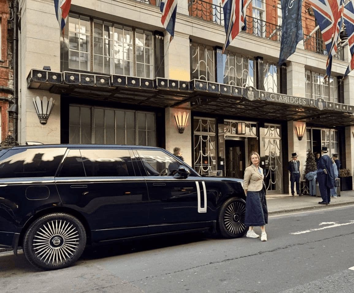 Claridge’s entrance, black cabs and classic cars staged for VIP departure.