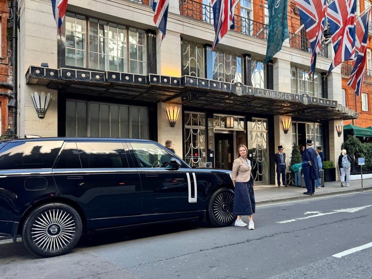 A Range Rover and private guide outside of Claridge's hotel